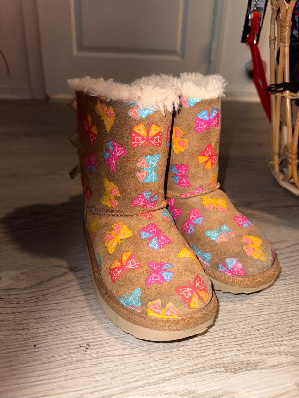 UGG Kids Tan Boot with Pink Yellow Blue Butterfly Print